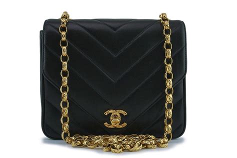 coco chanel black purse gold chain|pictures of old Chanel purses.